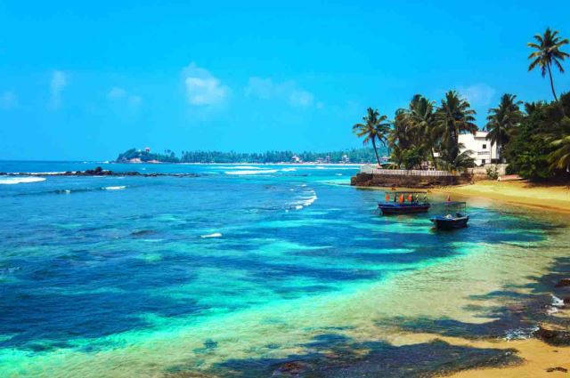 Pasikudah beach East Coast pristine bay turquoise waters Sri Lanka